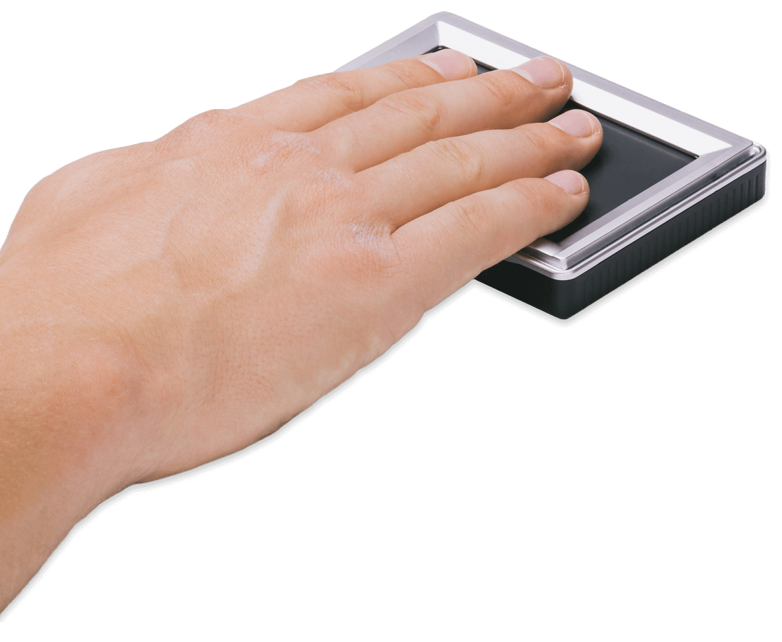 Integrated Biometrics Five-0 fingerprint scanner in use, four fingers placed on the platen